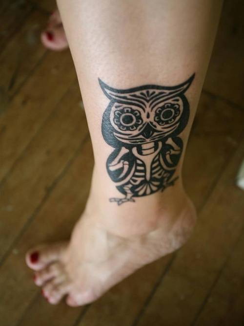 Black Tribal Owl Tattoo On Girl Left Ankle