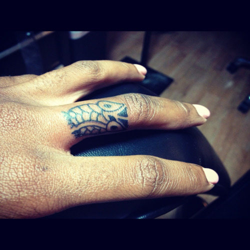 Black Tribal Owl Tattoo On Left Hand Finger