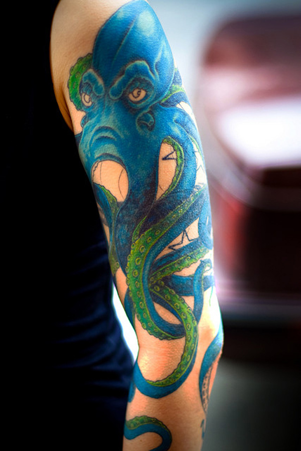 Blue And Green Octopus Tattoo On Left Full Sleeve