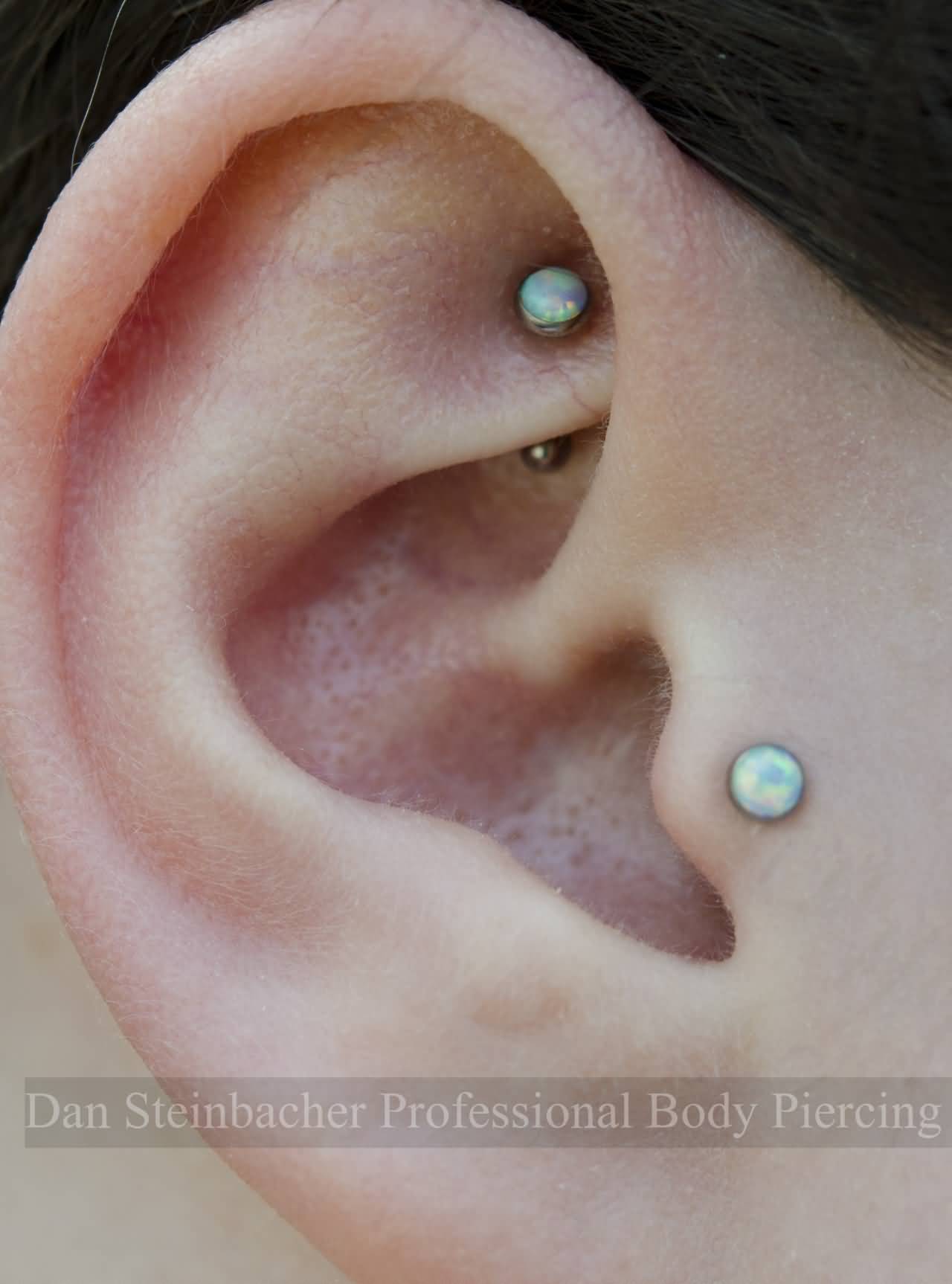 Blue Stud Tragus And Rook Piercing