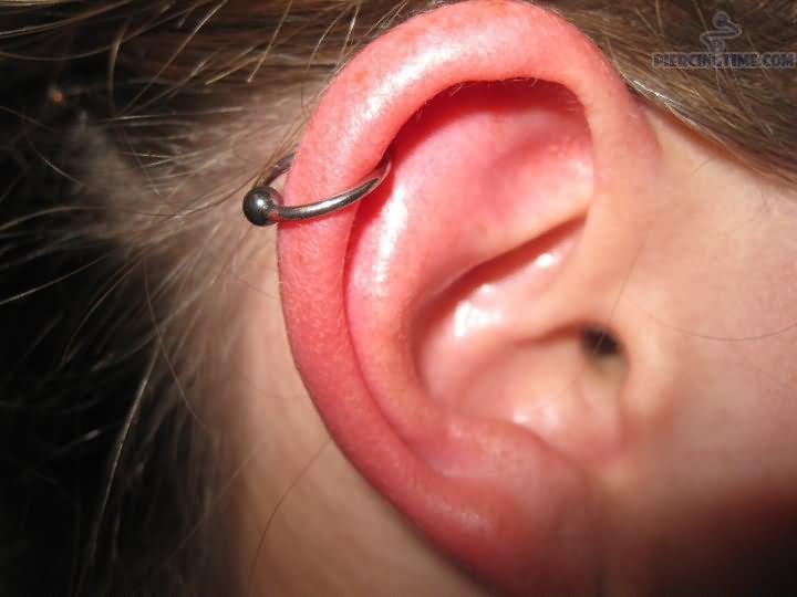 Cartilage Piercing With Silver Hoop Ring