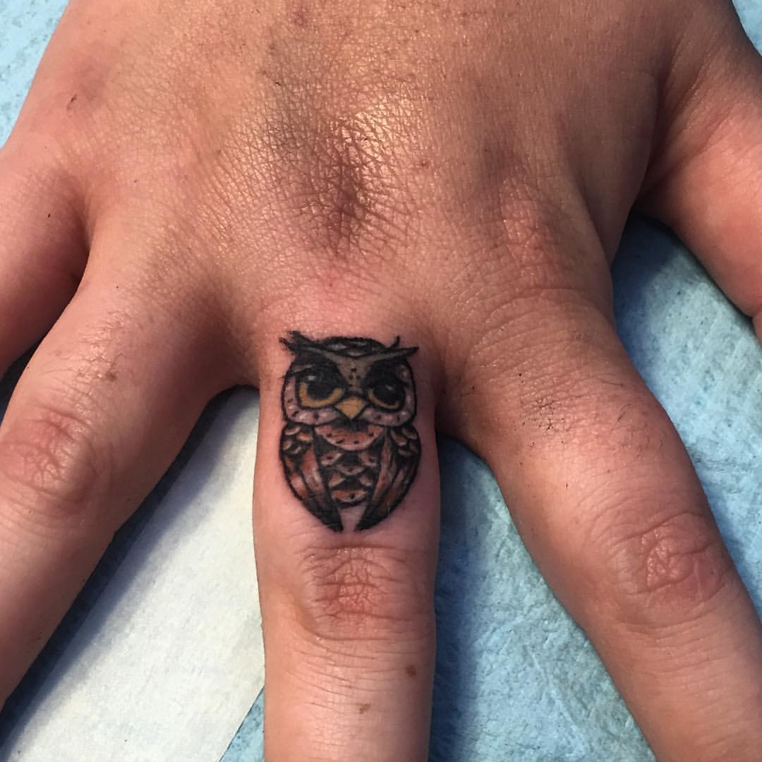 Classic Black Ink Owl Tattoo On Finger