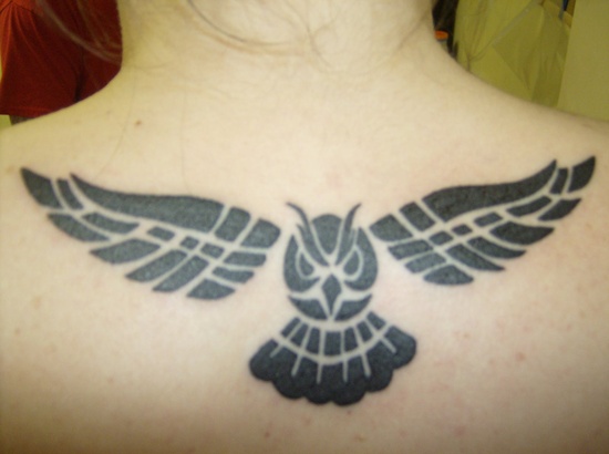 Classic Black Tribal Owl Tattoo On Upper Back