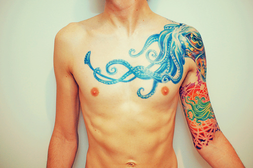 Colorful Octopus Tattoo On Man Left Shoulder And Chest
