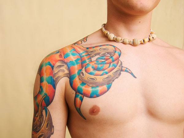 Colorful Octopus Tattoo On Man Right Shoulder