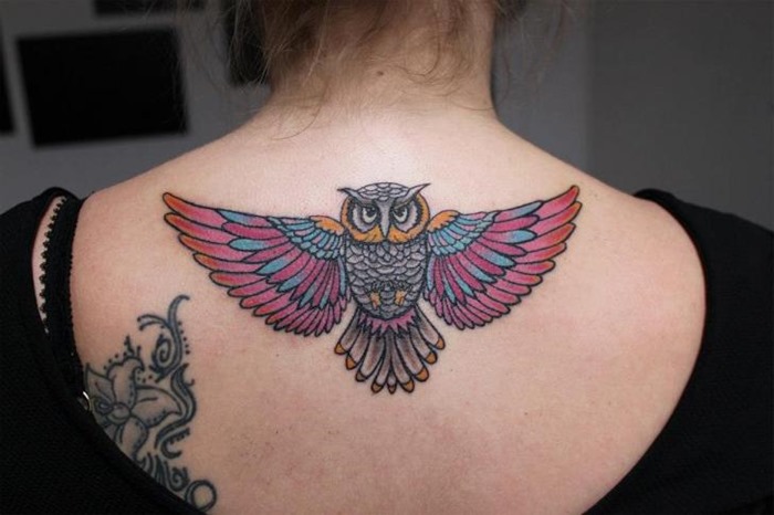 Colorful Owl Tattoo On Female Upper Back