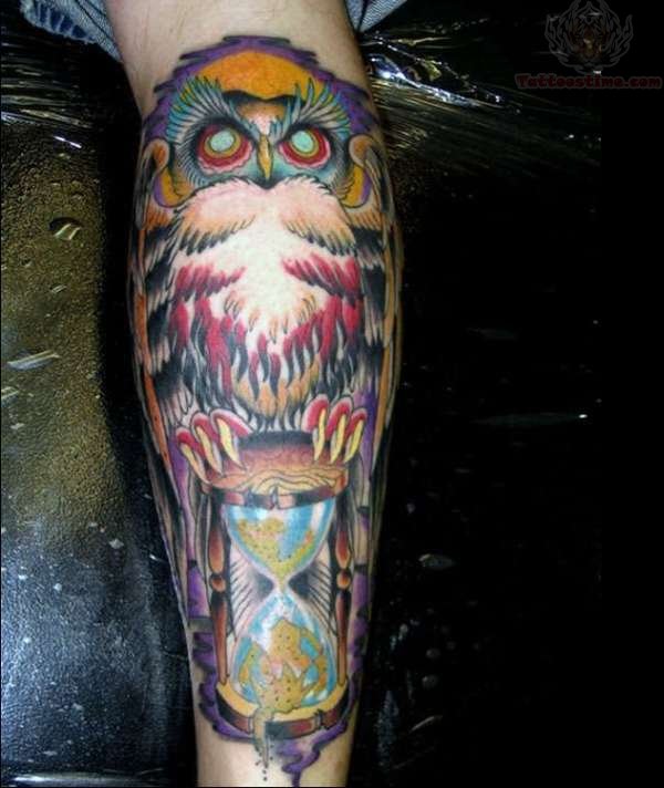 Colorful Owl With Hourglass Tattoo Design For Leg Calf