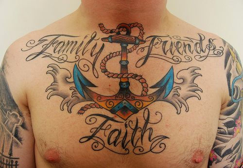 Colorful Traditional Anchor Tattoo On Man Chest
