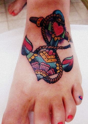 Colorful Traditional Anchor Tattoo On Women Left Foot