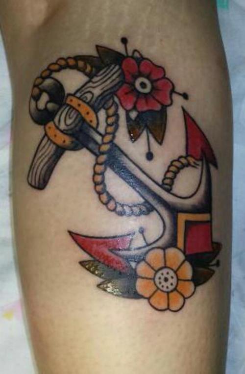 Colorful Traditional Anchor With Flowers Tattoo Design For Leg Calf
