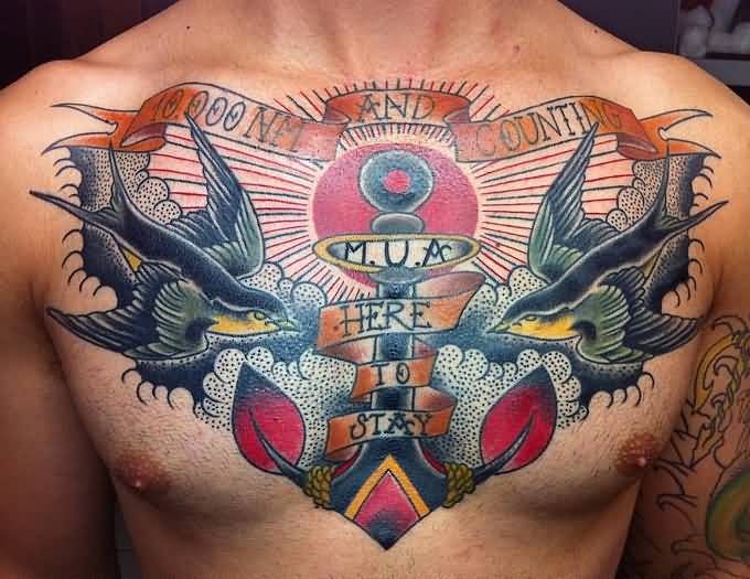 Colorful Traditional Anchor With Flying Birds And Banner Tattoo On Man Chest