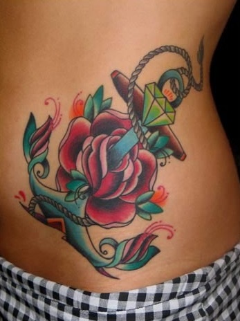 Colorful Traditional Anchor With Rose Tattoo On Hip