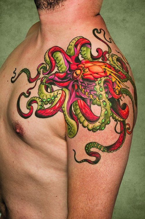 Colorful Traditional Octopus Tattoo On Man Left Shoulder