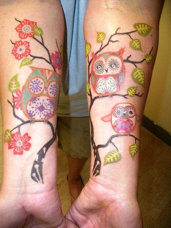 Colorful Unique Owl On Branch Tattoo On Both Forearm