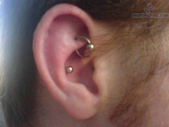 Conch And Rook Piercing With Hoop Ring