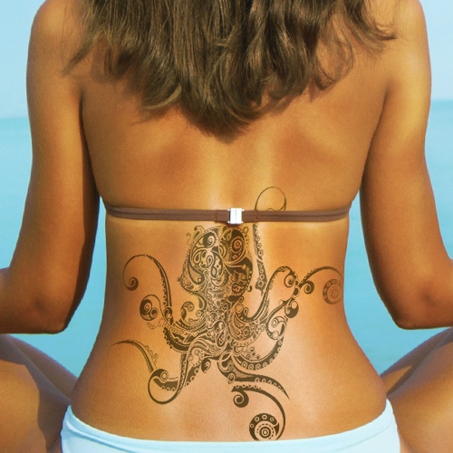 Cool Black Tribal Octopus Tattoo On Girl Lower Back