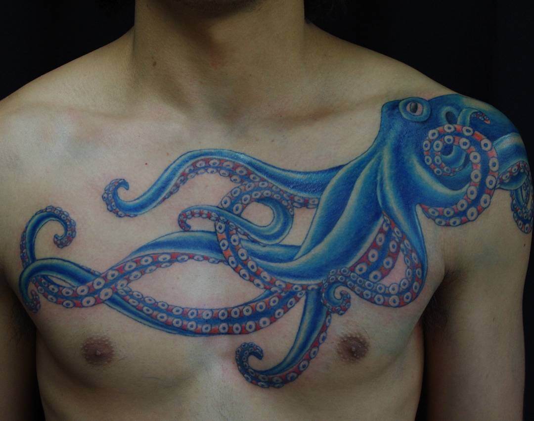 Cool Blue Ink Octopus Tattoo On Man Chest