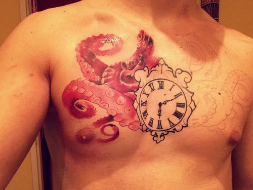 Cool Octopus With Clock Tattoo On Man Chest