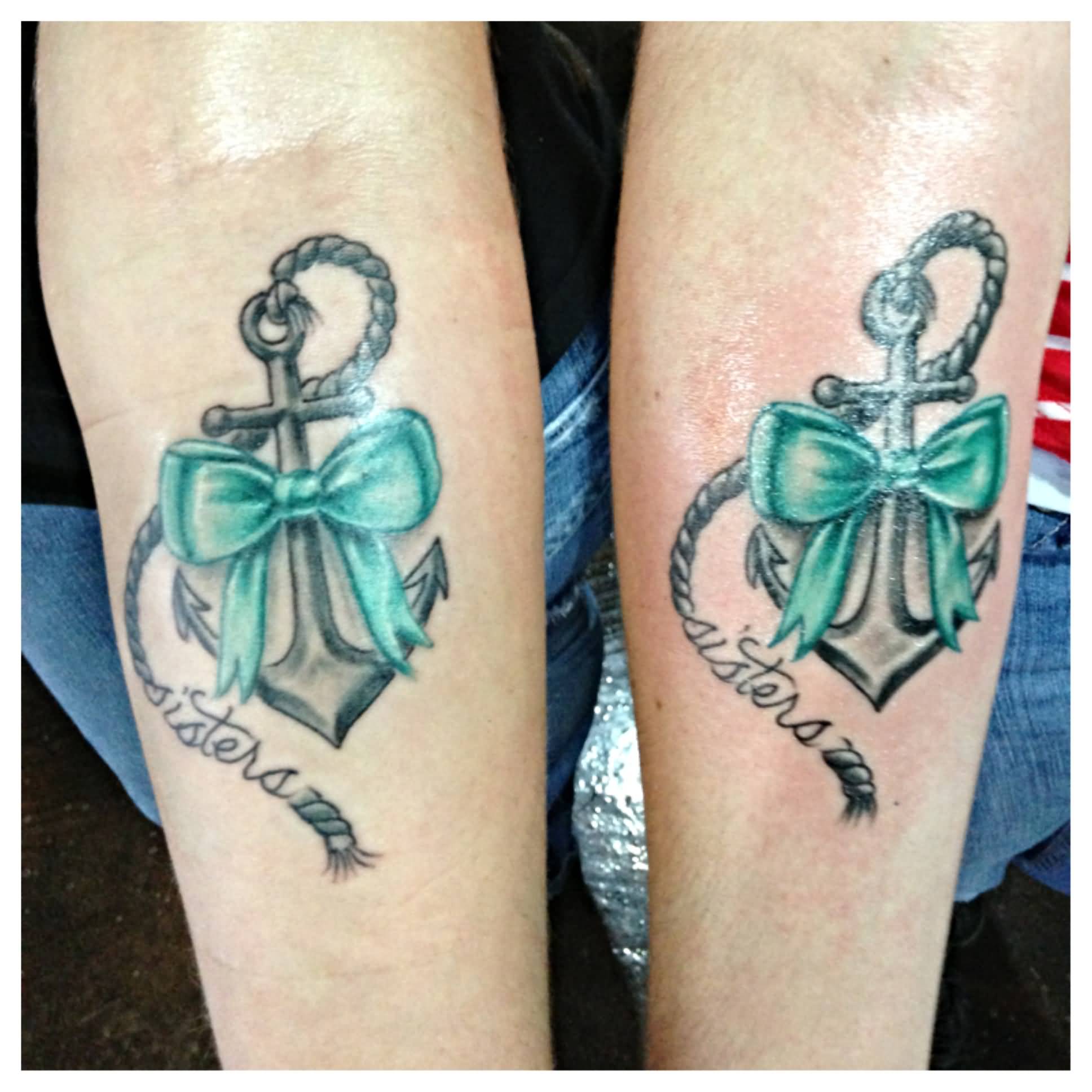 Cute Anchor With Bow Tattoo On Both Forearm