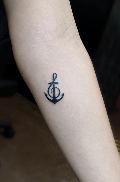 Cute Black Anchor Tattoo On Girl Forearm