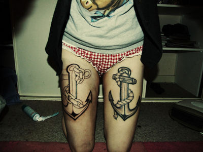 Cute Black Ink Anchor Tattoo On Both Thigh