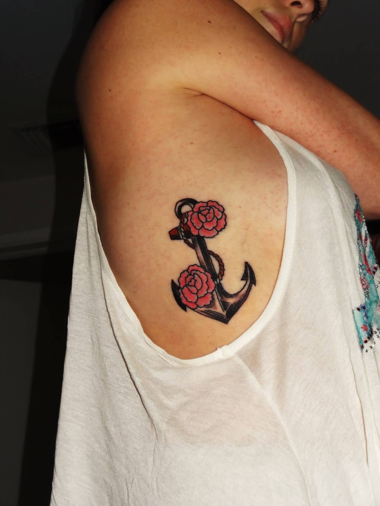 Cute Black Ink Anchor With Red Roses Tattoo On Right Side Rib