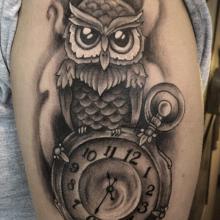 Cute Black Ink Owl With Pocket Watch Tattoo On Half Sleeve