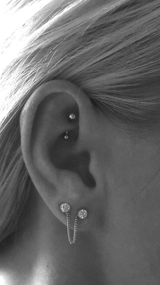 Cute Lobe And Rook Piercing With Silver Barbell