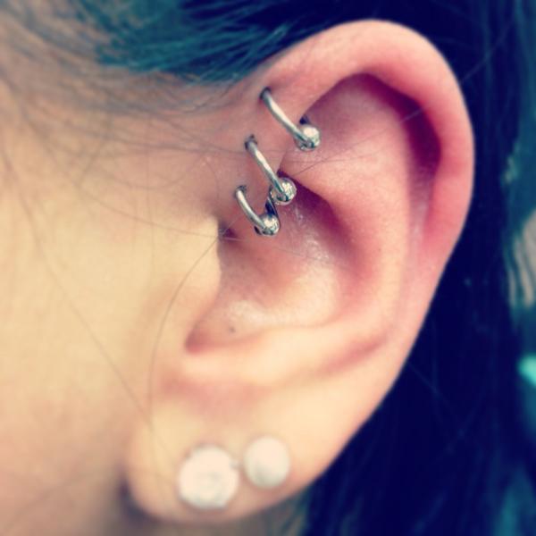 Dual Lobe And Inner Pinna Piercing With Silver Bead Rings