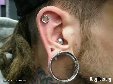 Ear Lobe And Dermal Punch Piercing For Men