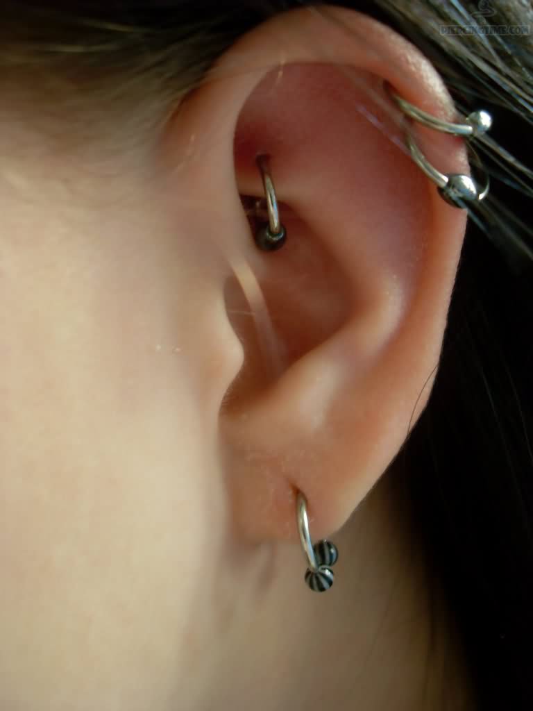 Ear Lobe And Dual Cartilage Piercing