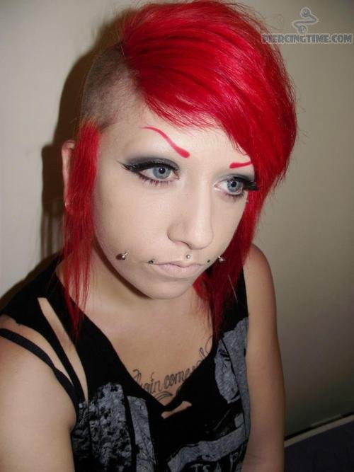 Emo Girl With Lip Piercing And Cheek Piercing