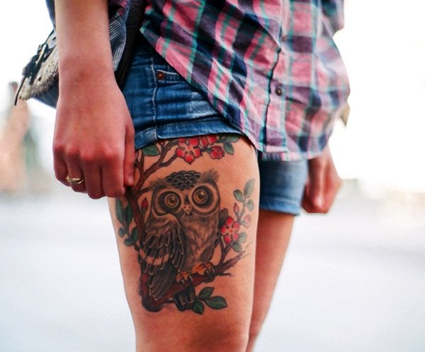 Fantastic Owl On Branch Tattoo On Girl Right Thigh