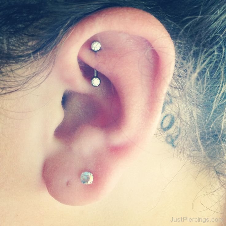 Girl Left Ear Lobe Piercing And Rook Piercing Picture