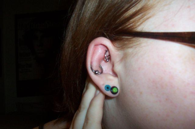 Girl Right Ear Dual Lobe With Daith And Rook Piercing
