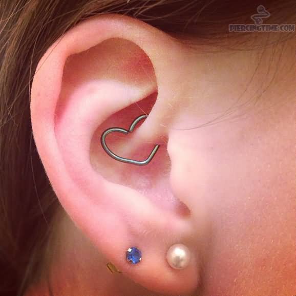 Girl With Dual Lobe And Rook Heart Piercing