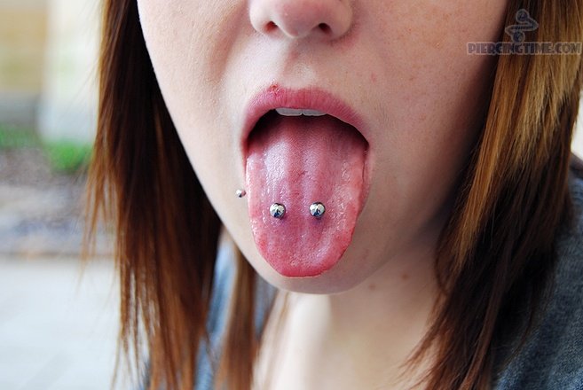 Girl With Surface Venom Piercing