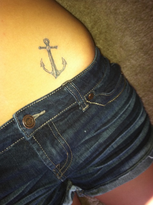 Grey Ink Anchor Tattoo On Girl Left Hip