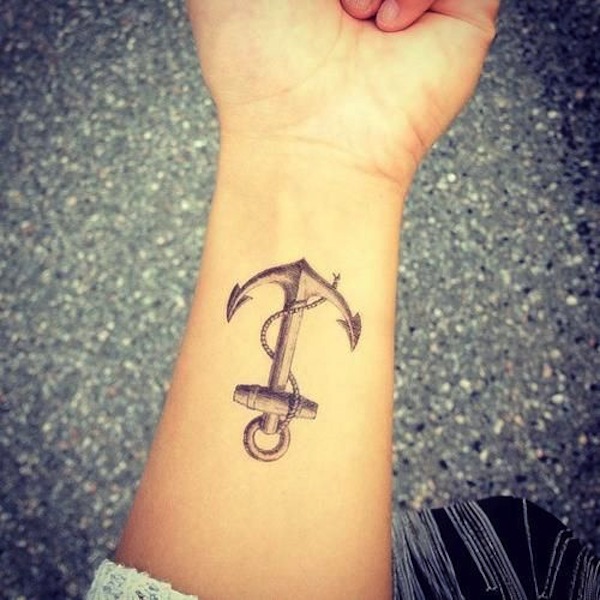 Grey Ink Anchor With Rope Tattoo On Girl Left Wrist
