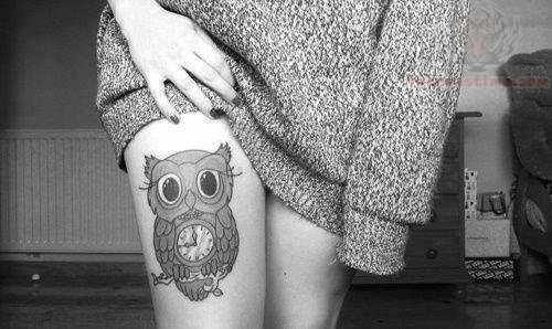 Grey Ink Owl With Clock Tattoo On Girl Right Thigh
