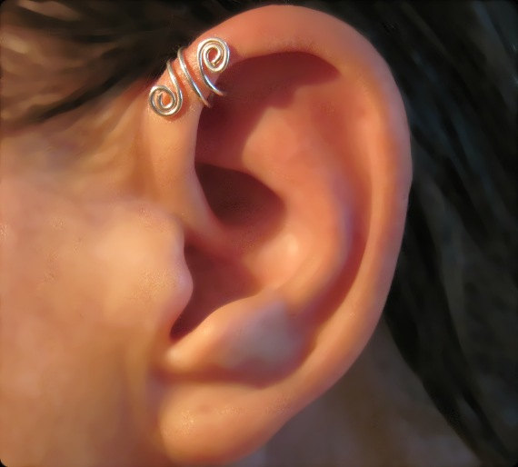 Inner Pinna Piercing With Silver Ear Cuff