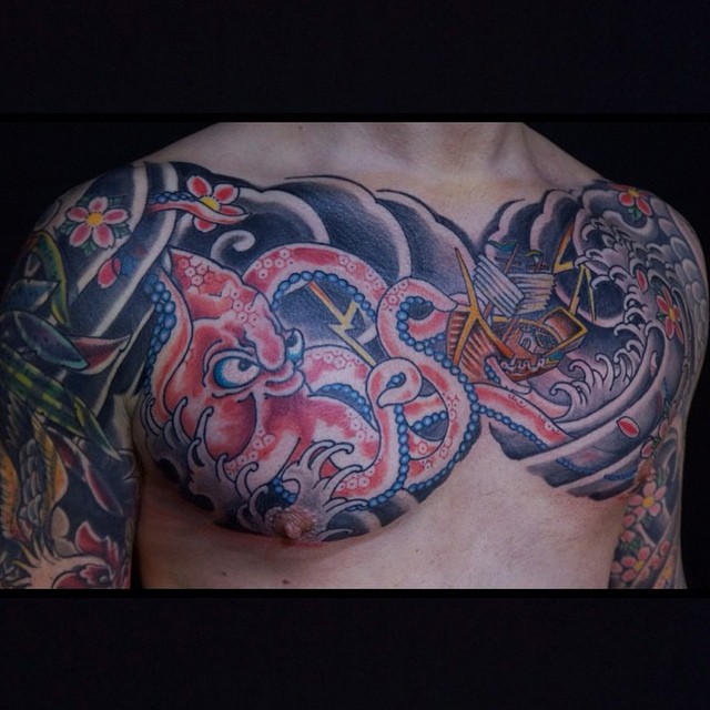 Japanese Octopus With Ship Tattoo On Man Chest