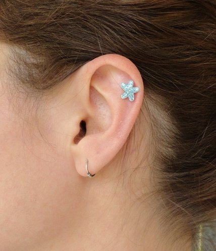 Left Ear Lobe And Star Stud Cartilage Piercing