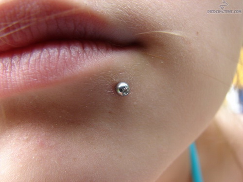 Lower Lip Piercing With Silver Stud