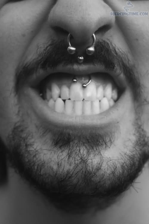 Man With Septum And Smiley Piercing
