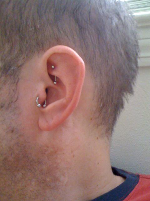 Man With Tragus And Rook Piercing Picture