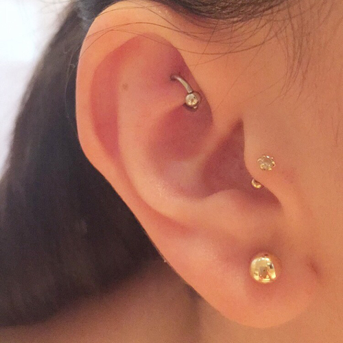 Nice Ear Lobe And Rook Piercing With Hoop Ring
