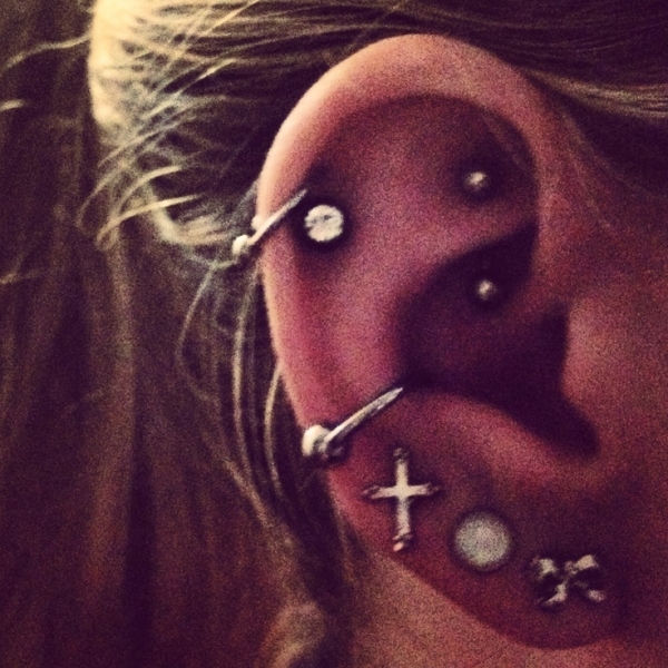 Nice Triple Lobe Piercing With Conch And Rook Piercing
