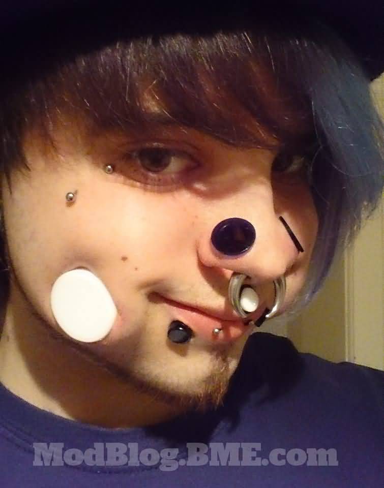 Nose Stretching And Cheek Piercing With White Gauge