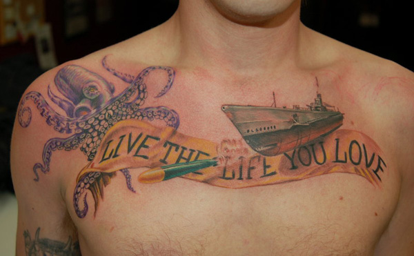 Octopus With Banner And Ship Tattoo On Man Chest